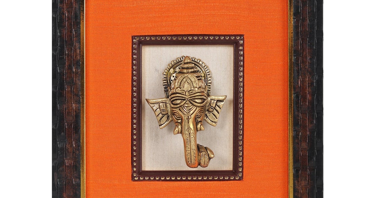 Wooden Framed Lord Ganapati Face in Brass Elegant Brass Wall Hanging